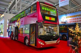 Double-decker EV bus of Wuzhoulong. Placement of the heavy battery pack in the chassis is a proposal to resolve center of gravity problems common in double-decker buses.