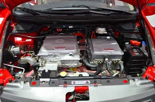 Engine bay of the BYD e6. The 100kW motor fills the space left normally utilized by a conventional engine.