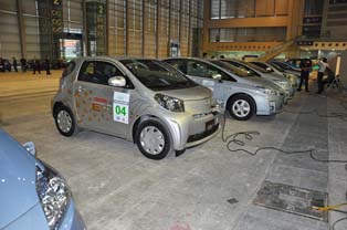 Parking area for test cars. Toyota supplied an EV version of the IQ and 10 Prius plug-in hybrids while GM and BYD Auto supplied the Volt and e6 respectively.