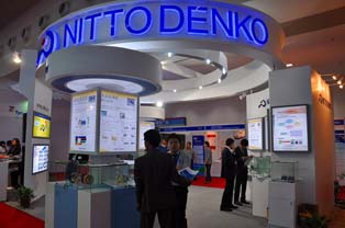 Nitto Denko’s booth, showcasing adhesive tape for automotive cables in response to the expanding demands expected in the EV era.