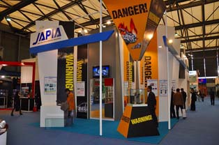 Display booth of JAPIA. Highlighting the risk of pirate-copy replacement parts