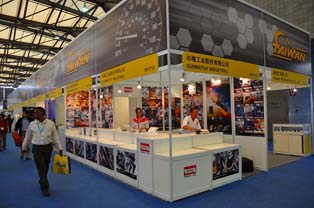 Display booth highlighting products from Taiwan. Focus on electronic components and replacement parts