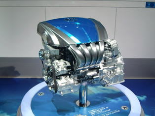 SKY-G next generation gasoline engine - scheduled to be introduced into models in Japan in 2011. Housed in Axela class models, the engine can realize fuel efficiency equivalent to the smaller class Demio.